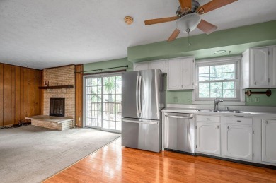 Welcome to this stunning brick ranch perfectly positioned on on Tates Creek Golf Course in Kentucky - for sale on GolfHomes.com, golf home, golf lot