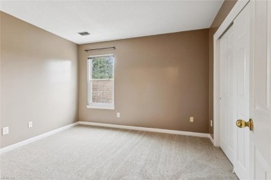 1st Floor Primary Bedroom Suite w/ Quartz & Low-Step Shower on Kiln Creek Golf and Country Club in Virginia - for sale on GolfHomes.com, golf home, golf lot