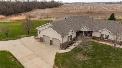 Enjoy stunning country views just steps from the Pine Island on Pine Island Golf Course in Minnesota - for sale on GolfHomes.com, golf home, golf lot