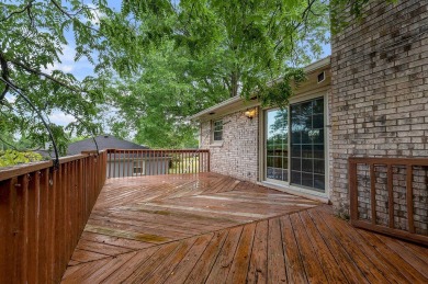 Welcome to this stunning brick ranch perfectly positioned on on Tates Creek Golf Course in Kentucky - for sale on GolfHomes.com, golf home, golf lot