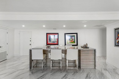 Experience coastal living at its finest in this fully updated on Palm Beach Par-3 Golf Course in Florida - for sale on GolfHomes.com, golf home, golf lot