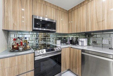 Experience coastal living at its finest in this fully updated on Palm Beach Par-3 Golf Course in Florida - for sale on GolfHomes.com, golf home, golf lot