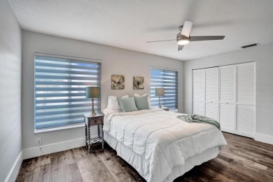 Stunning Remodeled Pool Home with Breathtaking Views & Country on Boca Woods Country Club in Florida - for sale on GolfHomes.com, golf home, golf lot