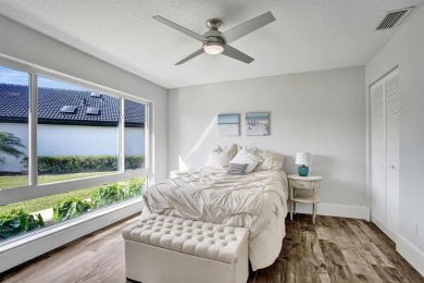 Stunning Remodeled Pool Home with Breathtaking Views & Country on Boca Woods Country Club in Florida - for sale on GolfHomes.com, golf home, golf lot