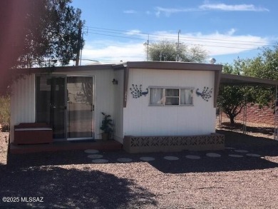 Very nice furnished north facing home with great mountain views on Tucson Estates Golf Course in Arizona - for sale on GolfHomes.com, golf home, golf lot