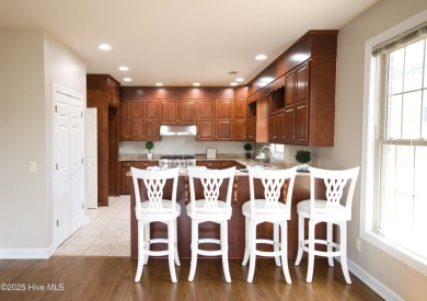 Welcome to this exceptional custom-built home in the prestigious on Ocean Ridge Plantation in North Carolina - for sale on GolfHomes.com, golf home, golf lot
