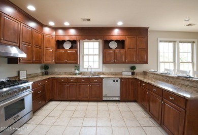 Welcome to this exceptional custom-built home in the prestigious on Ocean Ridge Plantation in North Carolina - for sale on GolfHomes.com, golf home, golf lot