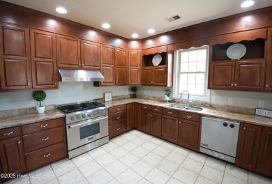 Welcome to this exceptional custom-built home in the prestigious on Ocean Ridge Plantation in North Carolina - for sale on GolfHomes.com, golf home, golf lot
