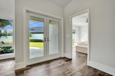 Stunning Remodeled Pool Home with Breathtaking Views & Country on Boca Woods Country Club in Florida - for sale on GolfHomes.com, golf home, golf lot