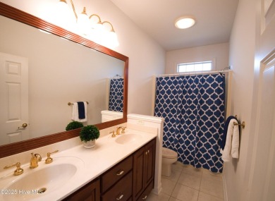 Welcome to this exceptional custom-built home in the prestigious on Ocean Ridge Plantation in North Carolina - for sale on GolfHomes.com, golf home, golf lot