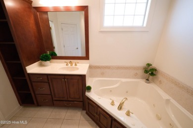 Welcome to this exceptional custom-built home in the prestigious on Ocean Ridge Plantation in North Carolina - for sale on GolfHomes.com, golf home, golf lot