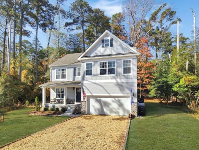 This charming 4-bedroom,  2.5-bathroom home in Captains Cove on Captains Cove Golf and Yacht Club in Virginia - for sale on GolfHomes.com, golf home, golf lot