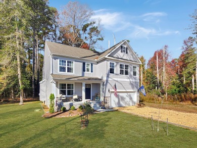 This charming 4-bedroom,  2.5-bathroom home in Captains Cove on Captains Cove Golf and Yacht Club in Virginia - for sale on GolfHomes.com, golf home, golf lot