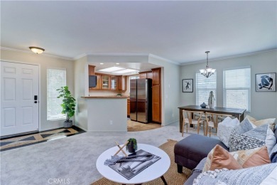 Experience refined living in this exquisite top-floor end unit on El Dorado Park Golf Course in California - for sale on GolfHomes.com, golf home, golf lot