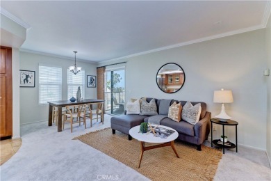Experience refined living in this exquisite top-floor end unit on El Dorado Park Golf Course in California - for sale on GolfHomes.com, golf home, golf lot