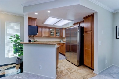 Experience refined living in this exquisite top-floor end unit on El Dorado Park Golf Course in California - for sale on GolfHomes.com, golf home, golf lot