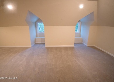 Welcome to this exceptional custom-built home in the prestigious on Ocean Ridge Plantation in North Carolina - for sale on GolfHomes.com, golf home, golf lot