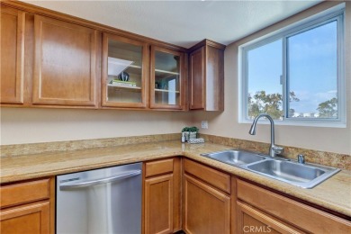 Experience refined living in this exquisite top-floor end unit on El Dorado Park Golf Course in California - for sale on GolfHomes.com, golf home, golf lot