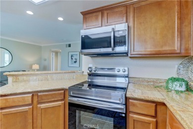 Experience refined living in this exquisite top-floor end unit on El Dorado Park Golf Course in California - for sale on GolfHomes.com, golf home, golf lot