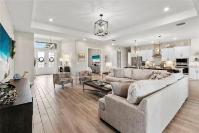 Under contract-accepting backup offers. 4813 Sparkling Sea Lane on Esplanade Golf and Country at Lakewood Ranch in Florida - for sale on GolfHomes.com, golf home, golf lot