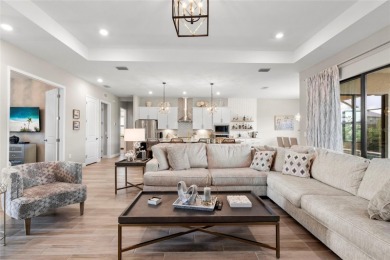 Under contract-accepting backup offers. 4813 Sparkling Sea Lane on Esplanade Golf and Country at Lakewood Ranch in Florida - for sale on GolfHomes.com, golf home, golf lot