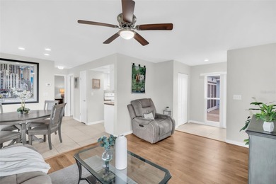 Beautifully renovated and spacious villa in Palm Harbor's on Highland Lakes Executive Golf Course in Florida - for sale on GolfHomes.com, golf home, golf lot