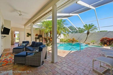 Beautifully updated 1994 Palmwood Bahama Breeze courtyard pool on Glen Lakes Country Club in Florida - for sale on GolfHomes.com, golf home, golf lot