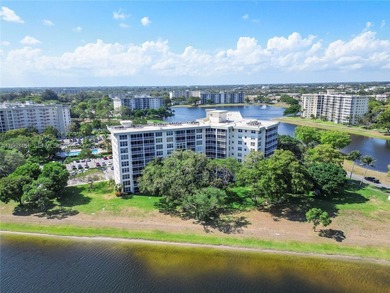Wow! Beautiful Corner Unit W/ Breathtaking Lake Views From on Palm-Aire Country Club and Resort - Palms in Florida - for sale on GolfHomes.com, golf home, golf lot