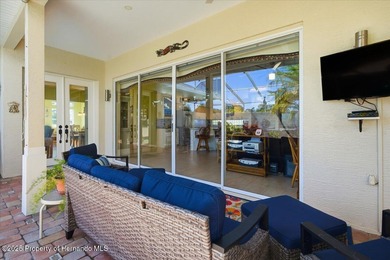 Beautifully updated 1994 Palmwood Bahama Breeze courtyard pool on Glen Lakes Country Club in Florida - for sale on GolfHomes.com, golf home, golf lot