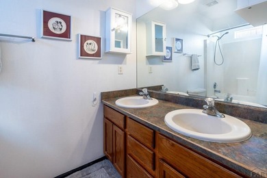 Move In ready classy home! Gracious floor plan and separates the on Desert Hawk At Pueblo West in Colorado - for sale on GolfHomes.com, golf home, golf lot