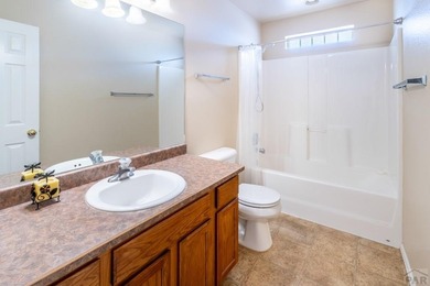 Move In ready classy home! Gracious floor plan and separates the on Desert Hawk At Pueblo West in Colorado - for sale on GolfHomes.com, golf home, golf lot