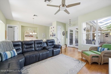 Beautifully updated 1994 Palmwood Bahama Breeze courtyard pool on Glen Lakes Country Club in Florida - for sale on GolfHomes.com, golf home, golf lot