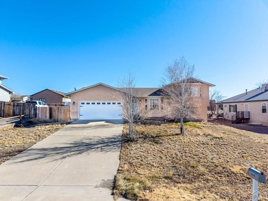 Move In ready classy home! Gracious floor plan and separates the on Desert Hawk At Pueblo West in Colorado - for sale on GolfHomes.com, golf home, golf lot