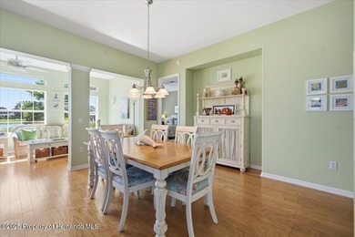 Beautifully updated 1994 Palmwood Bahama Breeze courtyard pool on Glen Lakes Country Club in Florida - for sale on GolfHomes.com, golf home, golf lot