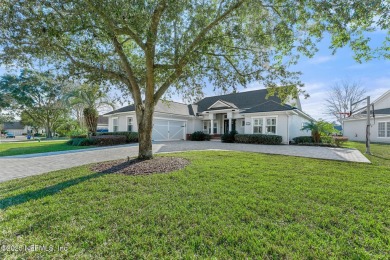 Beautifully renovated POOL w/ SPA home overlooking a serene lake on St. Johns Golf and Country Club in Florida - for sale on GolfHomes.com, golf home, golf lot