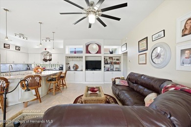 Beautifully updated 1994 Palmwood Bahama Breeze courtyard pool on Glen Lakes Country Club in Florida - for sale on GolfHomes.com, golf home, golf lot