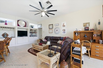 Beautifully updated 1994 Palmwood Bahama Breeze courtyard pool on Glen Lakes Country Club in Florida - for sale on GolfHomes.com, golf home, golf lot