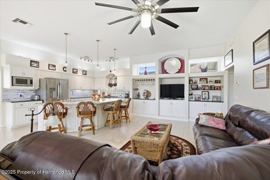 Beautifully updated 1994 Palmwood Bahama Breeze courtyard pool on Glen Lakes Country Club in Florida - for sale on GolfHomes.com, golf home, golf lot