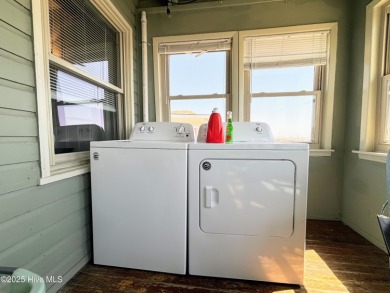 Unique oceanfront property features a total of 5 bedrooms and 3 on Founders Club At St. James Plantation in North Carolina - for sale on GolfHomes.com, golf home, golf lot