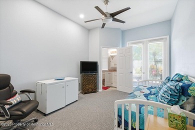 Beautifully updated 1994 Palmwood Bahama Breeze courtyard pool on Glen Lakes Country Club in Florida - for sale on GolfHomes.com, golf home, golf lot