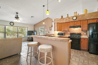 A Fantastic Find in a Fabulous Community equals Fantabulous on Plantation Golf Club in Florida - for sale on GolfHomes.com, golf home, golf lot