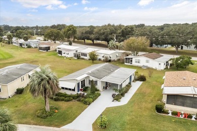 Stunning, completely remodeled 2-bedroom, 2-bathroom home with on Zellwood Station Country Club in Florida - for sale on GolfHomes.com, golf home, golf lot