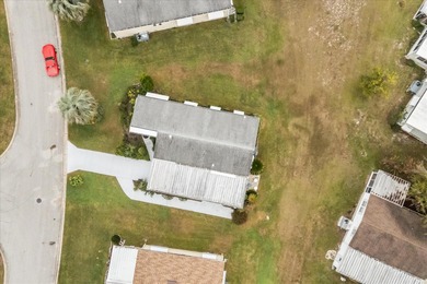 Stunning, completely remodeled 2-bedroom, 2-bathroom home with on Zellwood Station Country Club in Florida - for sale on GolfHomes.com, golf home, golf lot