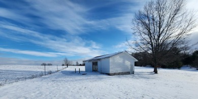 Enjoy the tranquil elevation spanning five acres, complete with on Benona Shores Golf Course in Michigan - for sale on GolfHomes.com, golf home, golf lot