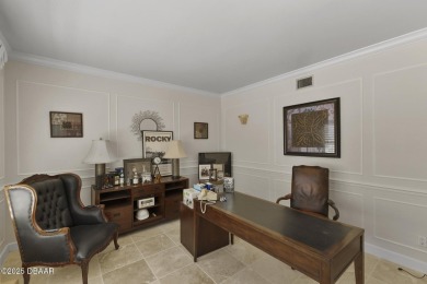 RARE AND DESIRABLE HANGAR HOME OFFERING IN THE EXCLUSIVE SPRUCE on Spruce Creek Golf Club in Florida - for sale on GolfHomes.com, golf home, golf lot