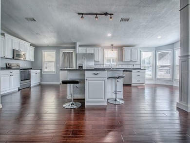 Completely remodeled manufactured home located in the desirable on El Diablo Executive Golf Course in Florida - for sale on GolfHomes.com, golf home, golf lot