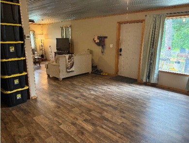 Welcome to this charming 2-bedroom, 1-bath getaway, perfectly on The Loon Golf Resort in Michigan - for sale on GolfHomes.com, golf home, golf lot