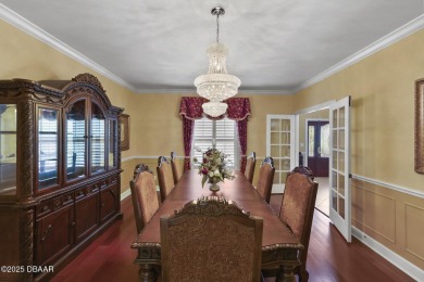 RARE AND DESIRABLE HANGAR HOME OFFERING IN THE EXCLUSIVE SPRUCE on Spruce Creek Golf Club in Florida - for sale on GolfHomes.com, golf home, golf lot