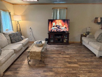Welcome to this charming 2-bedroom, 1-bath getaway, perfectly on The Loon Golf Resort in Michigan - for sale on GolfHomes.com, golf home, golf lot
