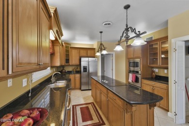 RARE AND DESIRABLE HANGAR HOME OFFERING IN THE EXCLUSIVE SPRUCE on Spruce Creek Golf Club in Florida - for sale on GolfHomes.com, golf home, golf lot